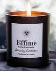 Effime Home Smoky Leather scented soy lit candle in a matt black glass jar1.