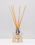 Relax in the exquisitely encapsulated, fresh aromatic herbal notes of Luxury long lasting lavender reed diffuser with natural wooden sticks in a 100ml clear glass bottle with silver top