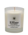 "Scented candle: frosted white glass jar with white label reading 'Effime Home Fragrance Lemongrass Ginger'.
Luxury Fresh home fragrance"