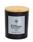 "Scented candle: Black glass jar with silver label reading 'Effime Home Fragrance Oud'.
Luxury Spicy and Woody home fragrance"