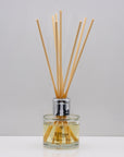 Rich decadent dark fruits with floral notes of rose, jasmine and fragrant patchouli Luxury long lasting Patchouli Rose reed diffuser with natural wooden sticks in a 100ml clear glass bottle with silver top