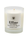 "Scented candle: frosted white glass jar with white label reading 'Effime Home Fragrance Sandalwood Myrrh'.
Luxury Spicy and Woody home fragrance"
