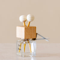 Relax with the scent of clean freshly washed towels of Luxury long lasting Soft Sheets Car diffuser with natural wooden sticks in a clear glass bottle with wooden top