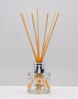 Relax with the scent of clean freshly washed towels of Luxury long lasting Soft Sheets reed diffuser with natural wooden sticks in a 100ml
clear glass bottle with silver top