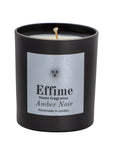 "Scented candle: Black glass jar with silver label reading 'Effime Home Fragrance Amber Noir'. 
Luxury Spicy and Woody home fragrance"