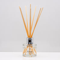Crisp uplifting aromas of wild meadow flowers and morning dew, nestled on a bed of sweet amber Luxury long lasting Bouquet reed diffuser with natural wooden sticks in a 100ml clear glass bottle with silver top.