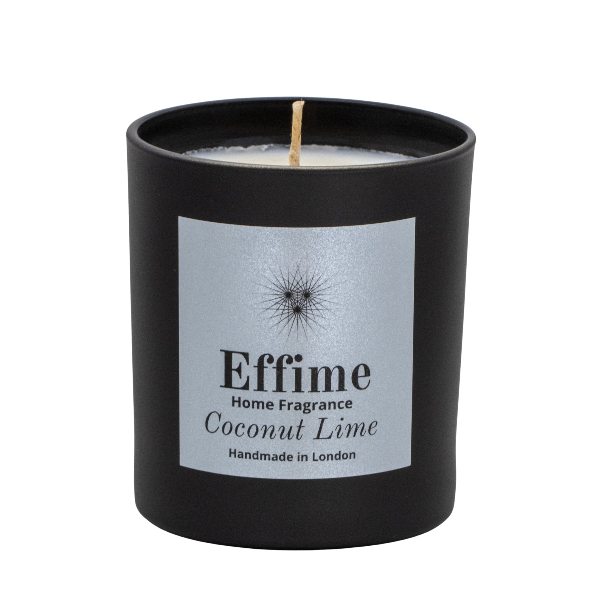 "Scented candle: Black glass jar with silver label reading 'Effime Home Fragrance Coconut Lime'. 
Luxury  Fresh and Fruity home fragrance"