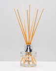 Sweet cinnamon, fresh orange, and woody clove lending itself to spicy and yet citrus aroma Luxury long lasting cosy reed diffuser with natural wooden sticks in a 100ml clear glass bottle with silver top.
