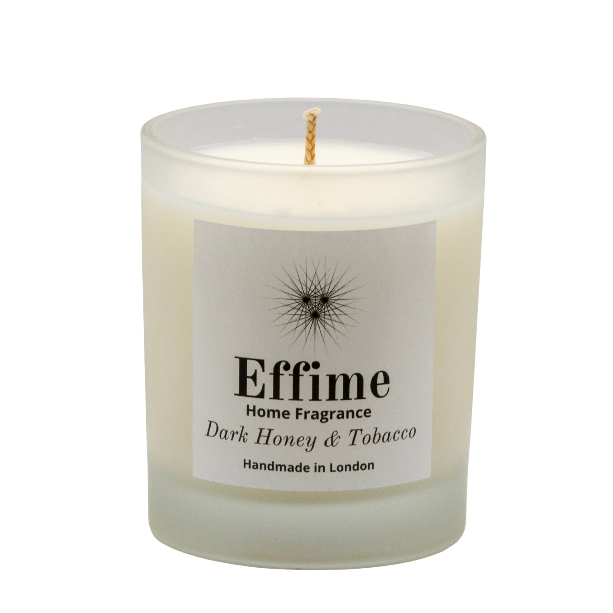 Scented candle: Frosted glass jar with white label reading 'Effime Home Fragrance Dark Honey & Tobacco'. 
Luxury fresh and musky home fragrance
