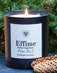 Effime Home Pine No.7 scented soy lit candle in a matt black glass jar with pines
