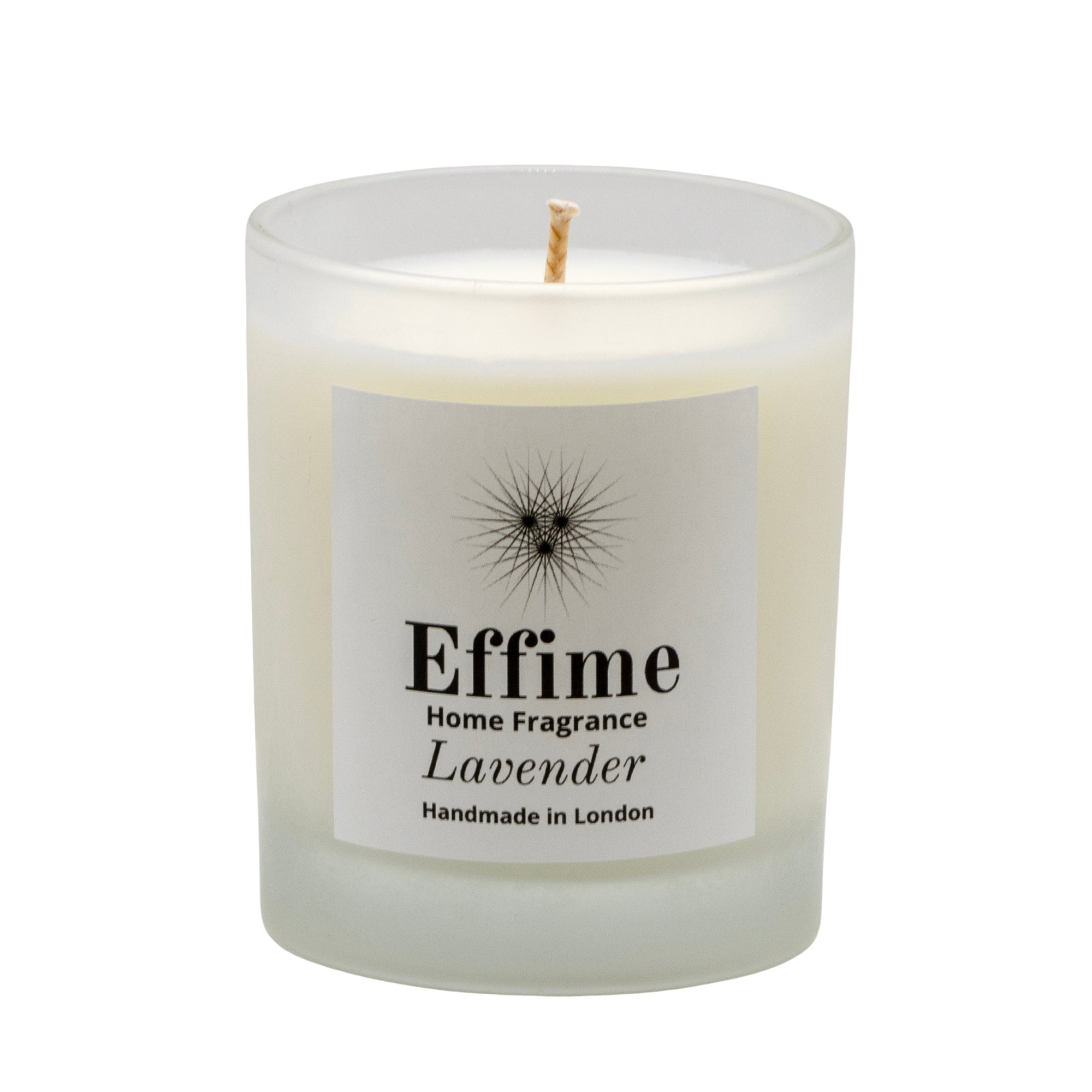 "Scented candle: frosted white  glass jar with white label reading 'Effime Home Fragrance    Lavender'. 
Luxury  Spicy and floral home fragrance"