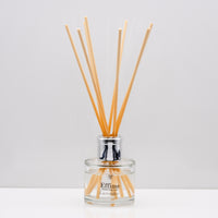 Relax in the exquisitely encapsulated, fresh aromatic herbal notes of Luxury long lasting lavender reed diffuser with natural wooden sticks in a 100ml clear glass bottle with silver top