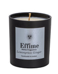 "Scented candle: Black glass jar with silver label reading 'Effime Home Fragrance Lemongrass Ginger'. 
Luxury  Fresh home fragrance"