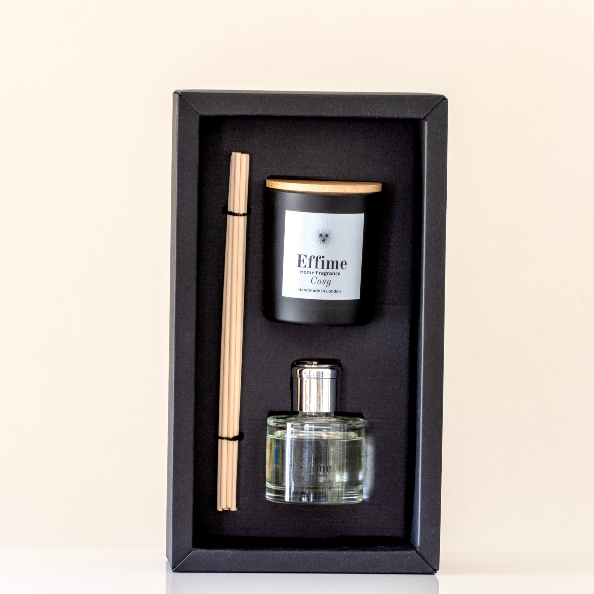 Scented candle and diffuser set with 'Effime' branding in a black box.