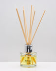 A delightful blend of sweet orange, mandarin and zesty lemon with subtle notes of bergamot Luxury long lasting Orange reed diffuser with natural wooden sticks in a 100ml clear glass bottle with silver top.