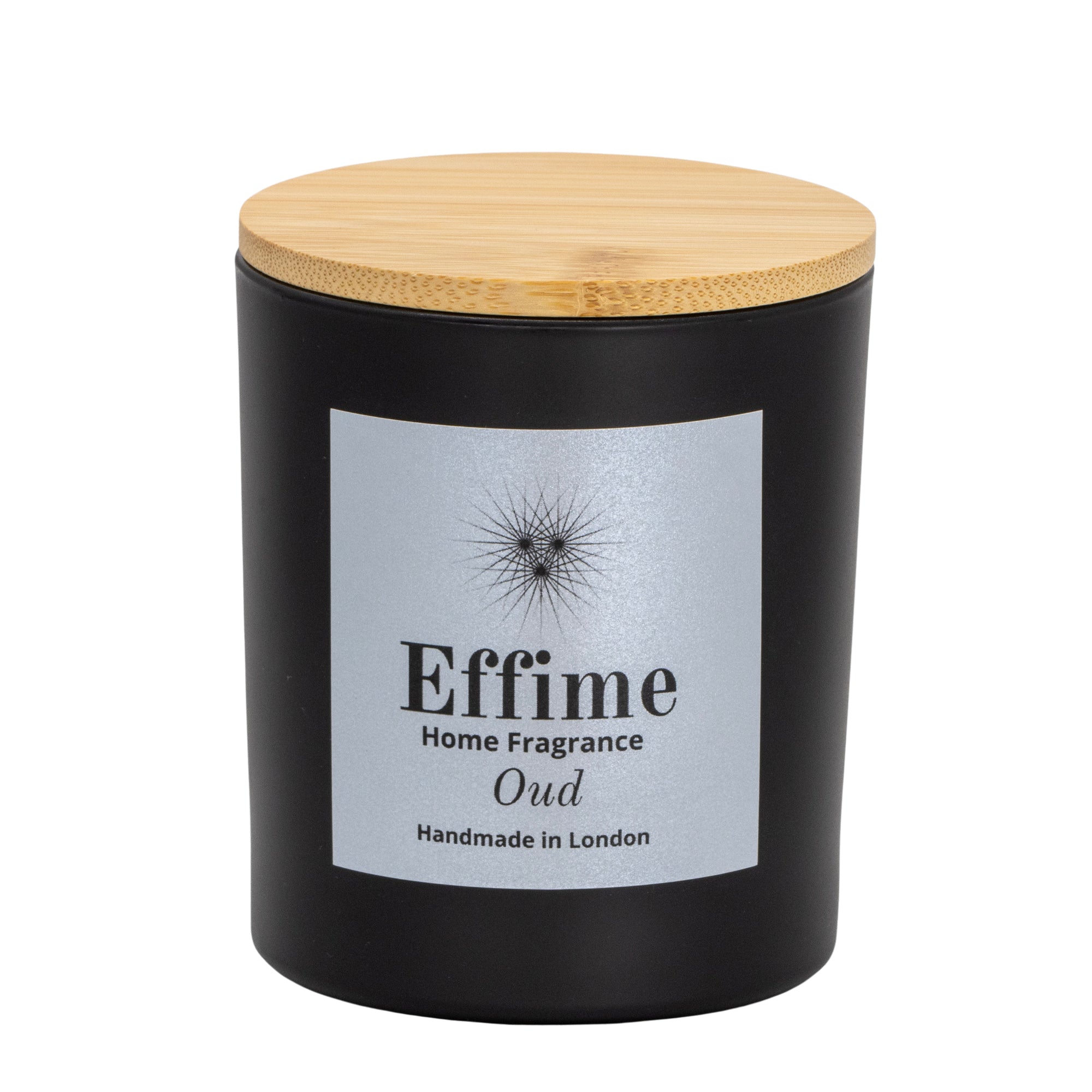 "Scented candle: Black glass jar with silver label reading 'Effime Home Fragrance Oud'. 
Luxury   Spicy and Woody home fragrance"
