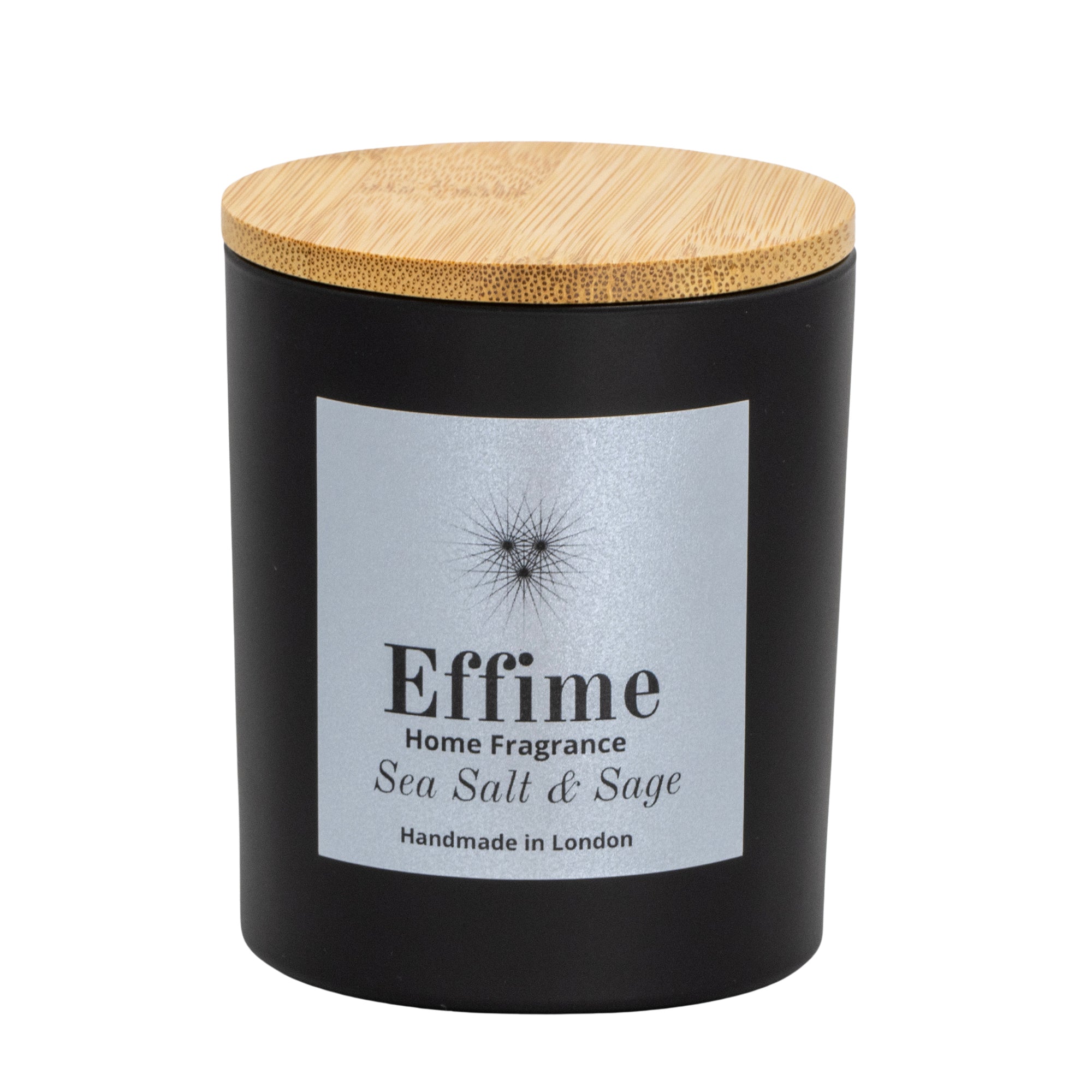 "Scented candle: Black glass jar with silver label reading 'Effime Home Fragrance Sea Salt & Sage'. 
Luxury Fresh and spicy home fragrance"