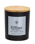 "Scented candle: Black glass jar with silver label reading 'Effime Home Fragrance Sea Salt & Sage'. 
Luxury Fresh and spicy home fragrance"