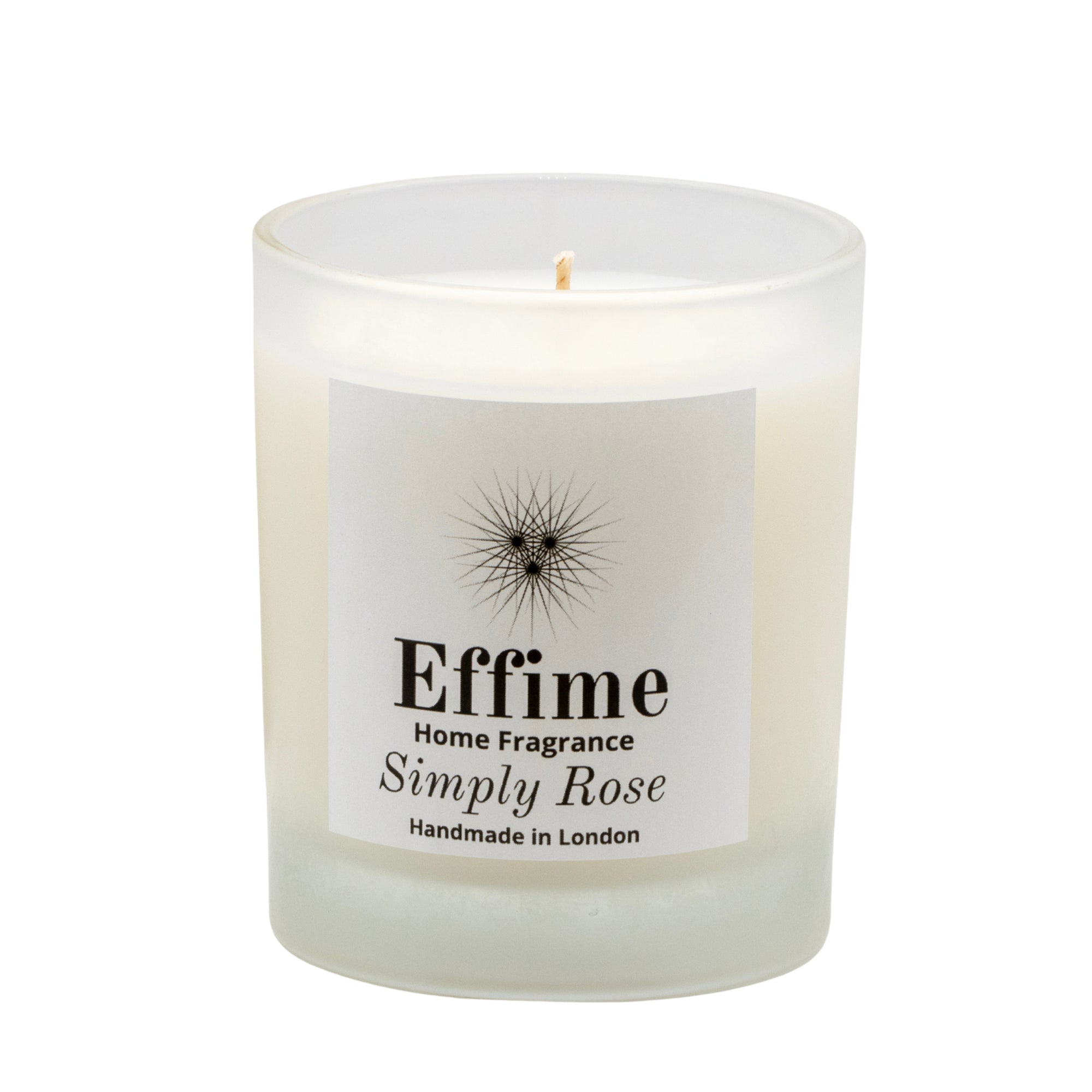"Scented candle: frosted white  glass jar with white label reading 'Effime Home Fragrance   Simply Rose'. 
Luxury Fresh and Floral home fragrance"