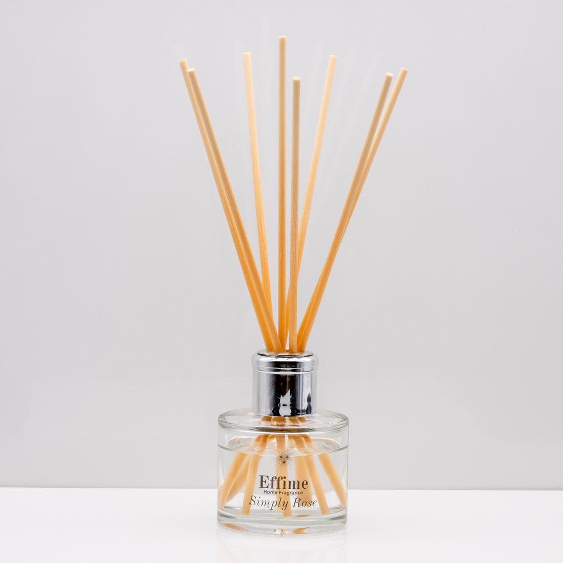 Take a stroll through an English garden, with inviting rose Luxury long lasting Simply Rose reed diffuser with natural wooden sticks in a 100ml clear glass bottle with silver top.