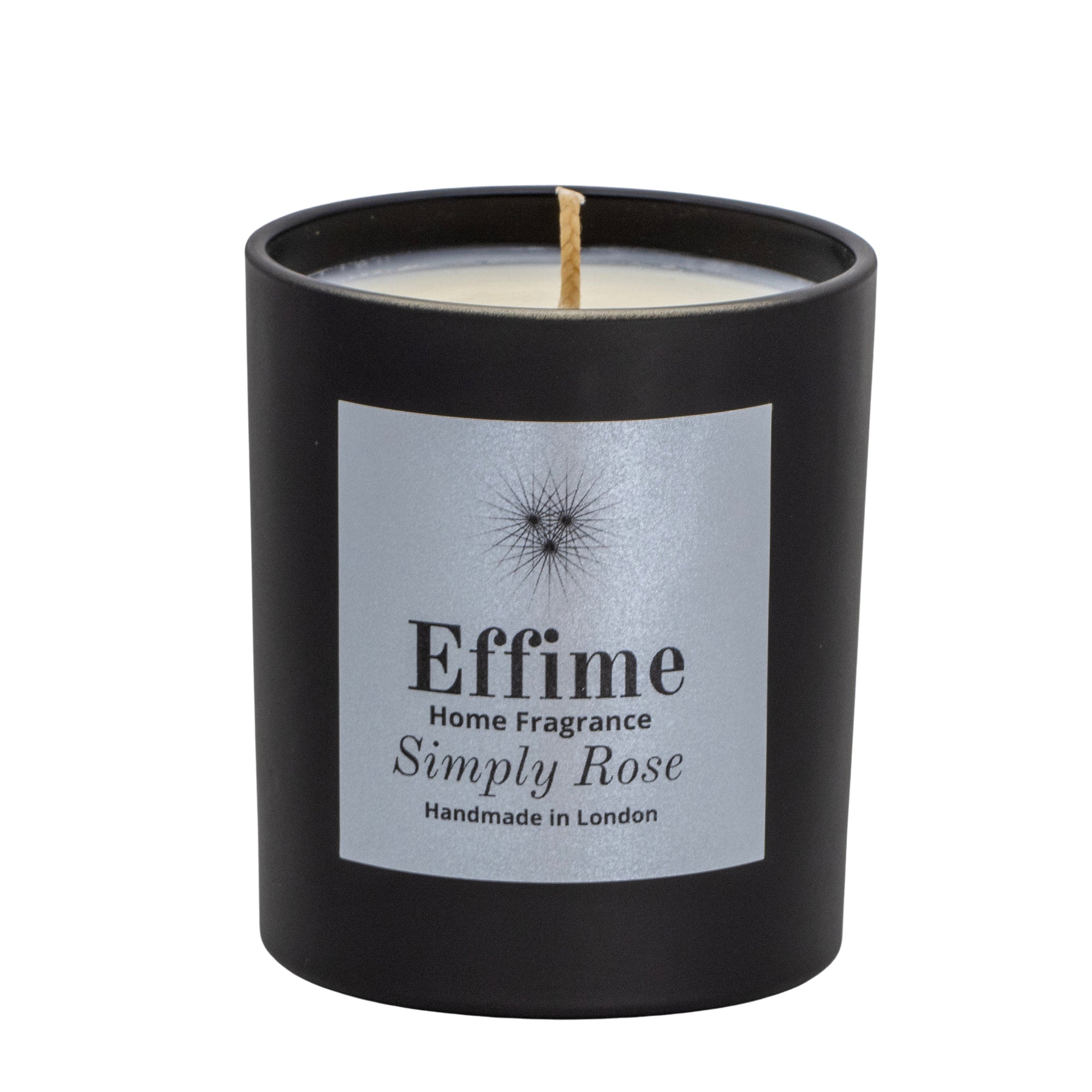 "Scented candle: Black glass jar with silver label reading 'Effime Home Fragrance Simply Rose'. 
Luxury Fresh and Floral home fragrance"