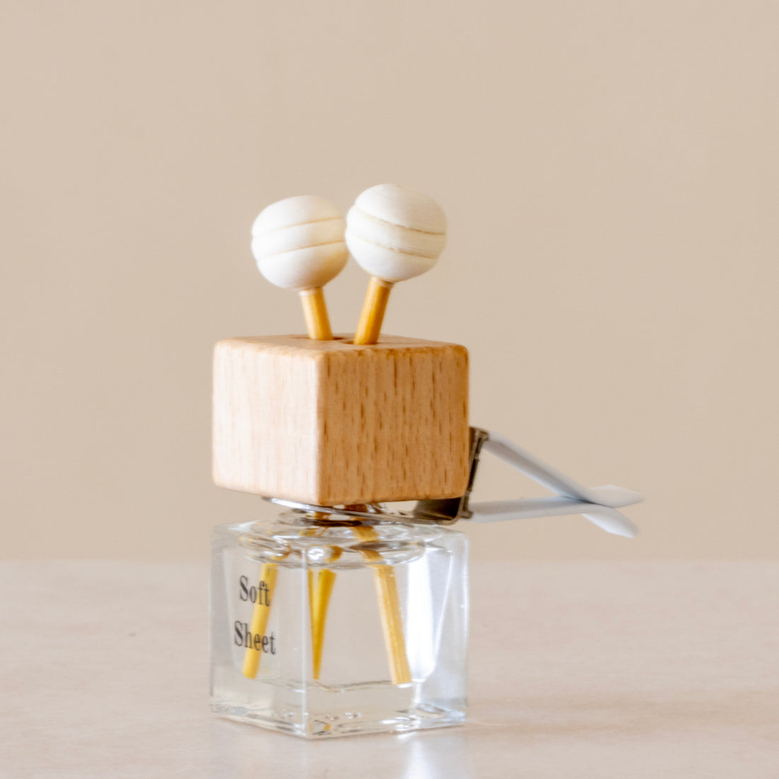 Relax with the scent of clean freshly washed towels of Luxury long lasting Soft Sheets Car diffuser with natural wooden sticks in a clear glass bottle with wooden top