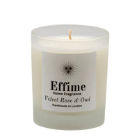 Scented candle: frosted white  glass jar with white label reading 'Effime Home Fragrance Velvet Rose & Oud'. 
Luxury Floral and Woody home fragrance