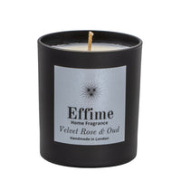 Scented candle: Black glass jar with silver label reading 'Effime Home Fragrance Velvet Rose & Oud'. 
Luxury Floral and Woody home fragrance